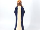 an image of a figurine of a woman with a crown on her head