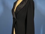 an image of a black suit on a mannequin stand