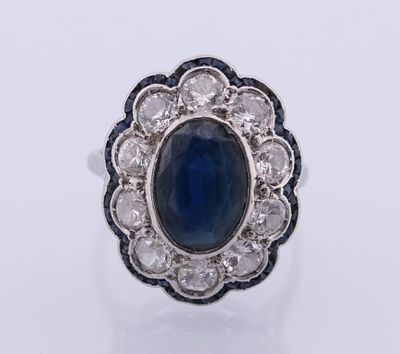 an oval sapphire and diamond ring