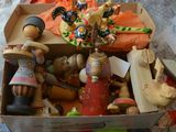 a box full of wooden toys sitting on a table