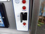 a close up of a machine with buttons and buttons on it