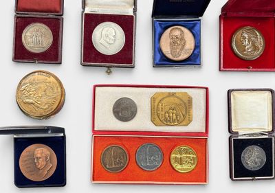 many different types of coins in a box