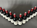 a group of bottles of wine sitting on top of a table