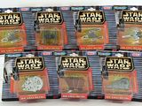 six star wars action figures in plastic bags on a white surface