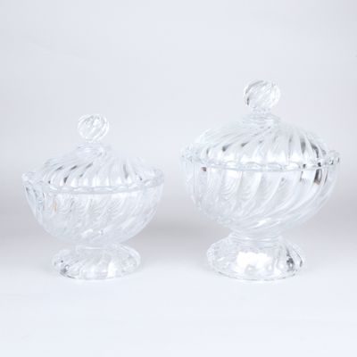 pair of clear glass sugar and creamer dishes on pedestals