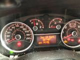 a close up of a car dashboard with various gauges and numbers
