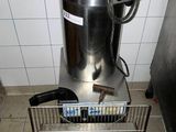 a metal container with a magazine holder on the side of it