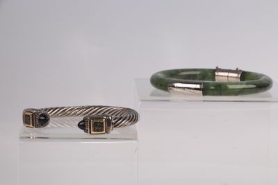 three different types of bracelets on display on a white surface