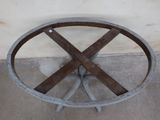 a wooden table with a metal frame on top of it