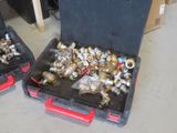 two black cases filled with different types of metal parts