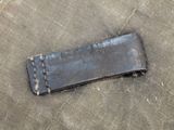 a piece of metal that has been placed on a piece of cloth