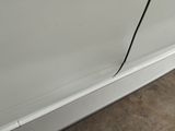 an image of a car with a broken door handle