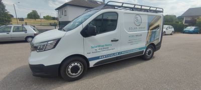 a van that is parked in a parking lot
