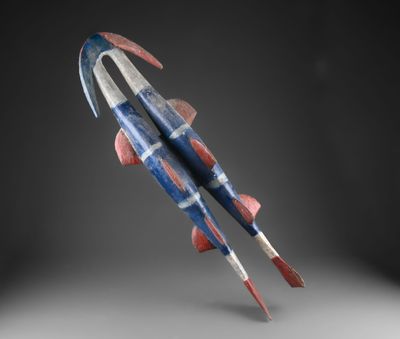 un gros plan d'une fusée jouet volant dans les airs