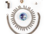 a collection of jewellery including a necklace, bracelet and ring