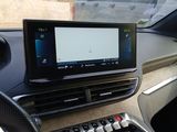 a picture of a car dashboard with a remote control