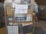 a cart with a lot of boxes on it in a warehouse