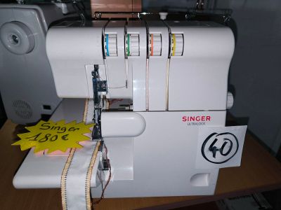 a sewing machine that is sitting on a table
