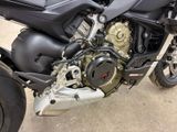 a motorcycle that is parked on the side of the road