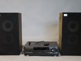 two speakers that are next to each other on a table