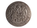 an image of a silver coin with a coat of arms on it