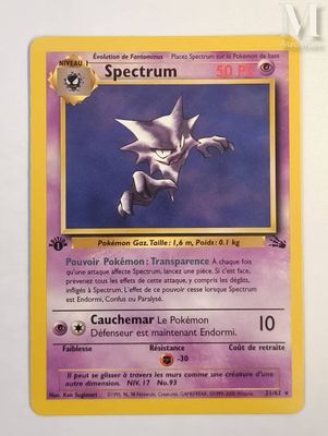 a close up of a pokemon card on a white surface
