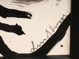 a black and white picture of a painting on a wall