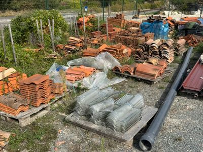 a lot of bricks and other items on the ground