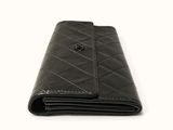 wallet case made of black leather with a quilted design
