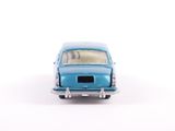 a toy car that is sitting on a white surface