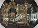 a decorative plate with a picture of a palace on it