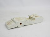an old wooden shoe with a hole in the middle of it