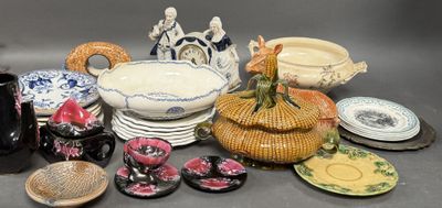 many different types of dishes and bowls on the table