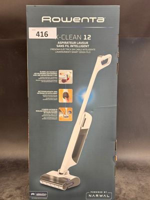 a box of a vacuum cleaner sitting on top of a counter