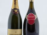 deux bouteilles de vin posées l'une à côté de l'autre sur une table