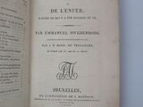 an open book with a black and white image of a man ' s hand holding a book