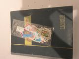 a box of stamps on a table with a picture on it