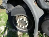 a close up of a flat tire on a truck