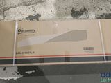 a box that is sitting on the floor next to a pair of scissors