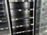 a refrigerator that is open and empty in a store