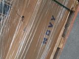 a pallet full of boxes with some plastic wrap on it
