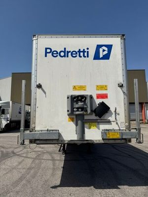 a truck that is parked in front of a building