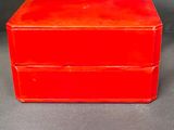 an image of a red box sitting on top of a table