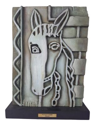 painting of a horse head on a stone block with a brick wall in the background
