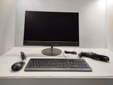 an image of a computer desk with a keyboard and mouse