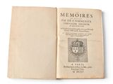an open book with a picture of a crown on it