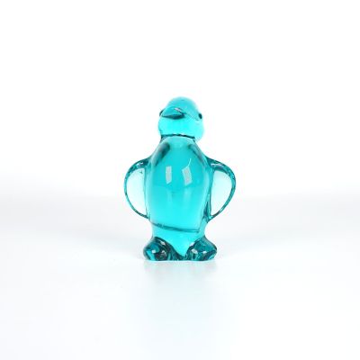 DAUM : Canard, sujet en cristal teinté vert-bleu, non signé,…