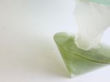 a piece of glass that is sitting on a table
