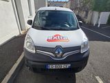 a white van parked on the side of the road
