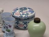 many different vases sitting on a table together